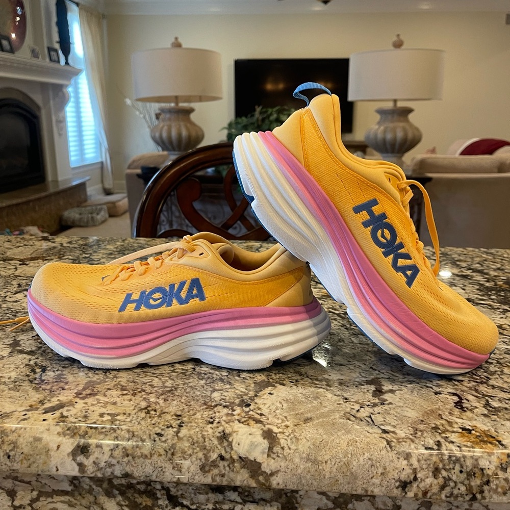 Hoka Yellow and Pink Running Shoes